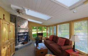 Sunroom and Fireplace - Country homes for sale and luxury real estate including horse farms and property in the Caledon and King City areas near Toronto