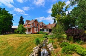 House and Waterfall - Country homes for sale and luxury real estate including horse farms and property in the Caledon and King City areas near Toronto