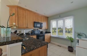 Apartment Kitchen - Country homes for sale and luxury real estate including horse farms and property in the Caledon and King City areas near Toronto