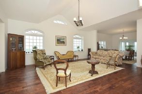 Living Room with Vaulted Ceiling open to Kitchen - Country homes for sale and luxury real estate including horse farms and property in the Caledon and King City areas near Toronto