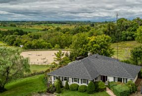 Top Bungalow Overlooks Property - Country homes for sale and luxury real estate including horse farms and property in the Caledon and King City areas near Toronto