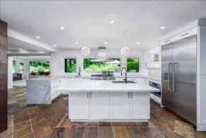 Kitchen opens to Sun Room - Country homes for sale and luxury real estate including horse farms and property in the Caledon and King City areas near Toronto