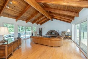 Large Great Room with Deck access on both sides - Country homes for sale and luxury real estate including horse farms and property in the Caledon and King City areas near Toronto