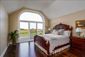 Primary bedroom with walk-out - Country homes for sale and luxury real estate including horse farms and property in the Caledon and King City areas near Toronto