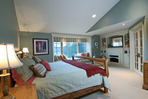 Master bedroom with fireplace and bow window - Country homes for sale and luxury real estate including horse farms and property in the Caledon and King City areas near Toronto